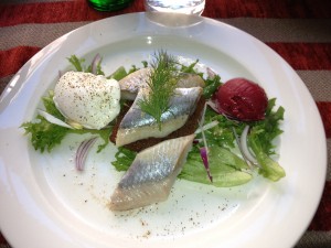 Herring, black bread, quail's egg & beet ice cream